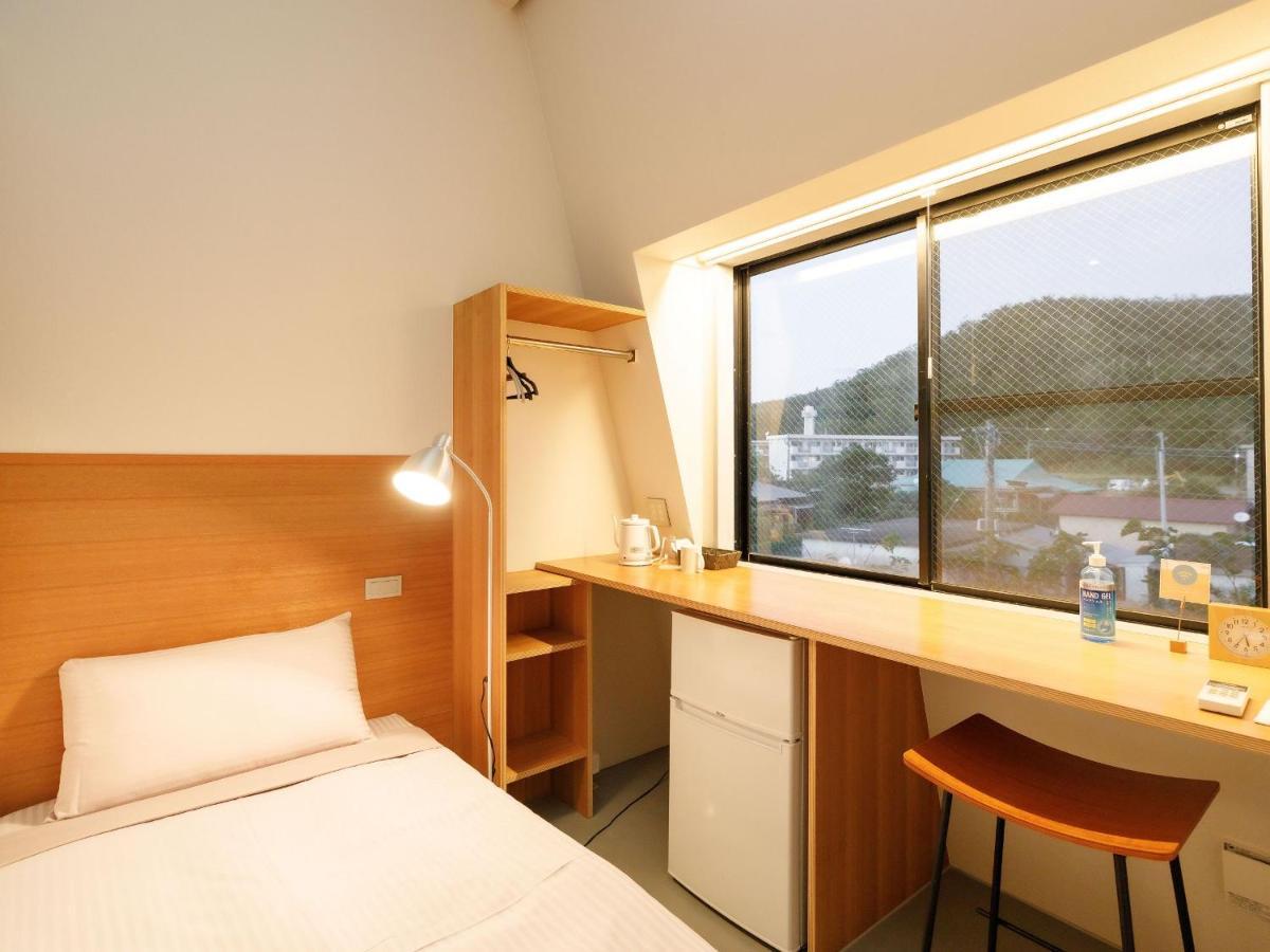 Denpaku Akakina Hotel Амами Экстерьер фото